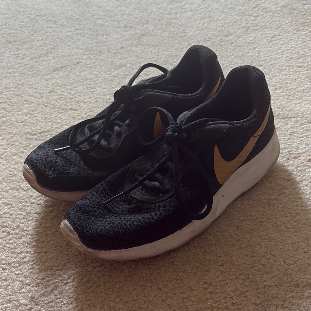Nike Black and Gold Sneakers with Mesh Upper